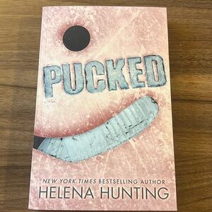 NWOT Pucked by Helena Hunting
